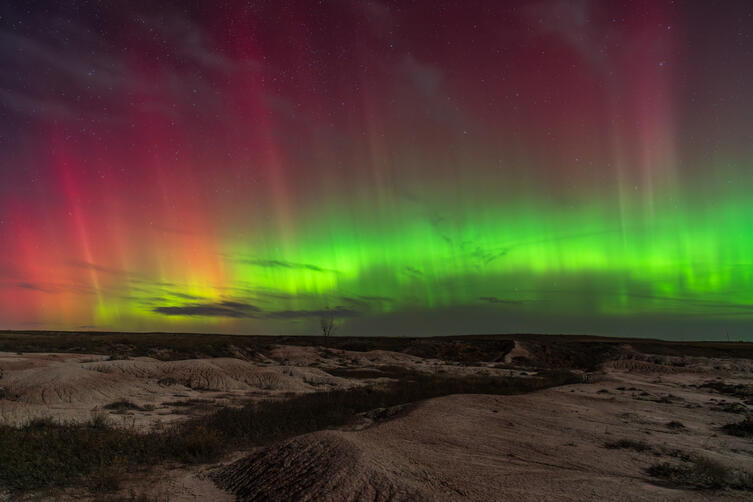 Aurora over Badlands National Park in South Dakota